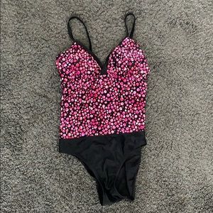 Pink and black polka dot bathing suit